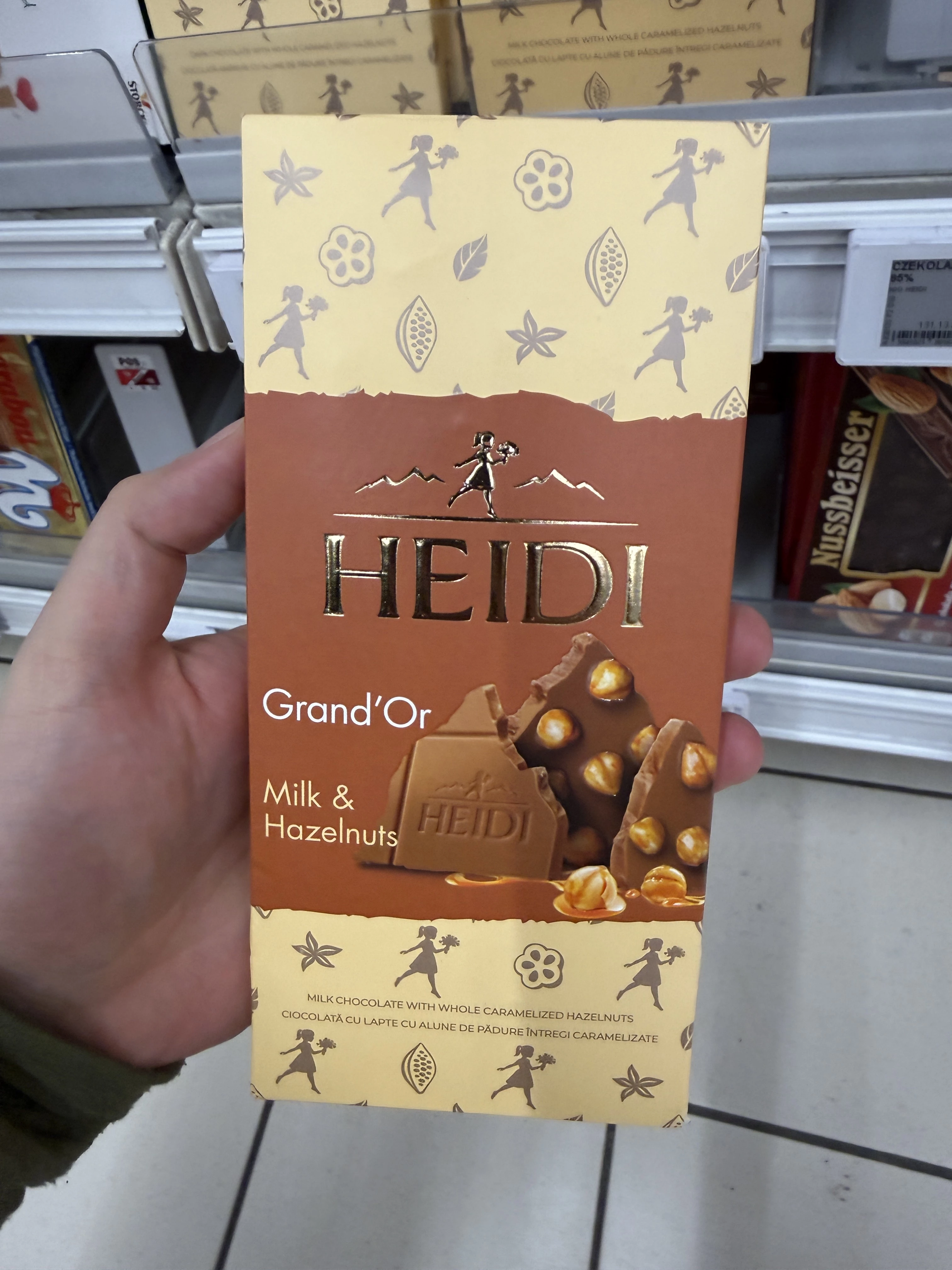 Heidi Grand’Or Milk & Hazelnuts / Czekolada mleczna z całymi karmelizowanymi orzechami laskowymi | 100g