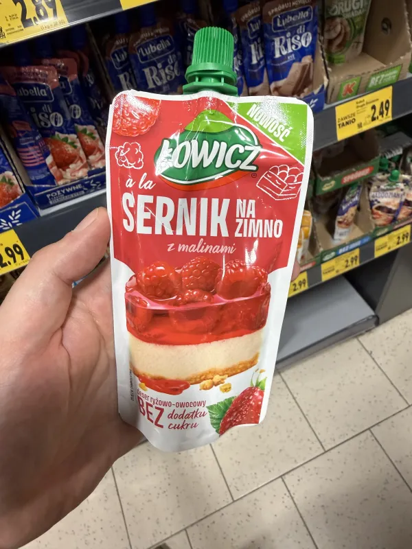 Łowicz à la Sernik na zimno z malinami Deser ryżowo-owocowy | 100g