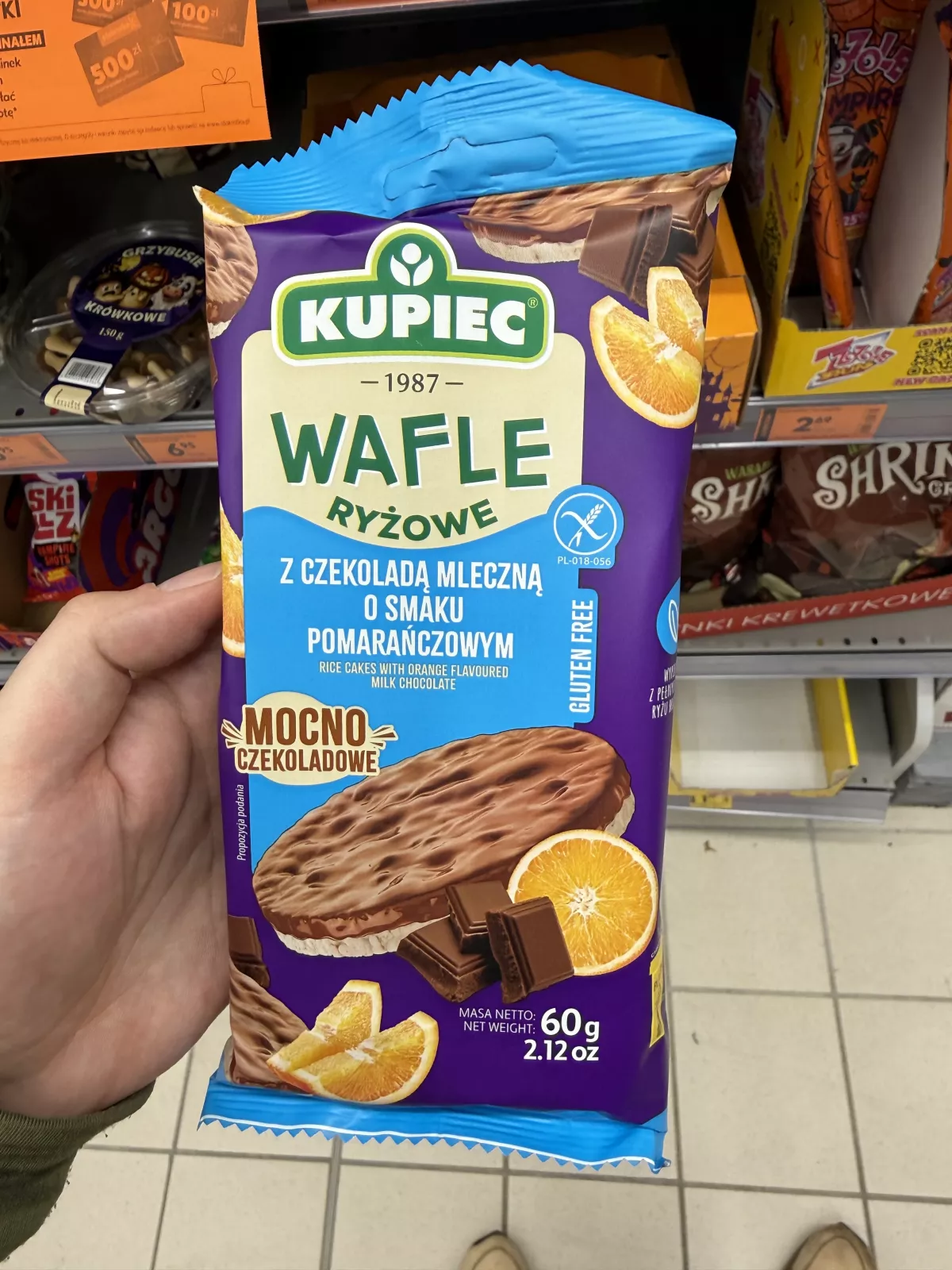 Kupiec Wafle ryżowe z czekoladą mleczną o smaku pomarańczowym | 60g