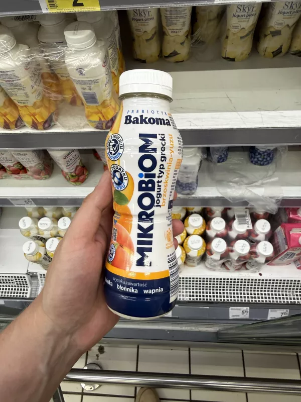 Bakoma Prebiotyk Mikrobiom jogurt pitny typ grecki brzoskwinia-yuzu | 300g