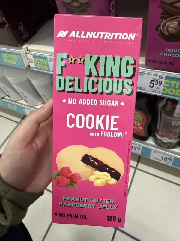 Allnutrition F**king Delicious No Added Sugar Cookie Peanut Butter Raspberry Jelly / Ciastka kakaowe z nadzieniem malinowym w polewie arachidowej | 128g